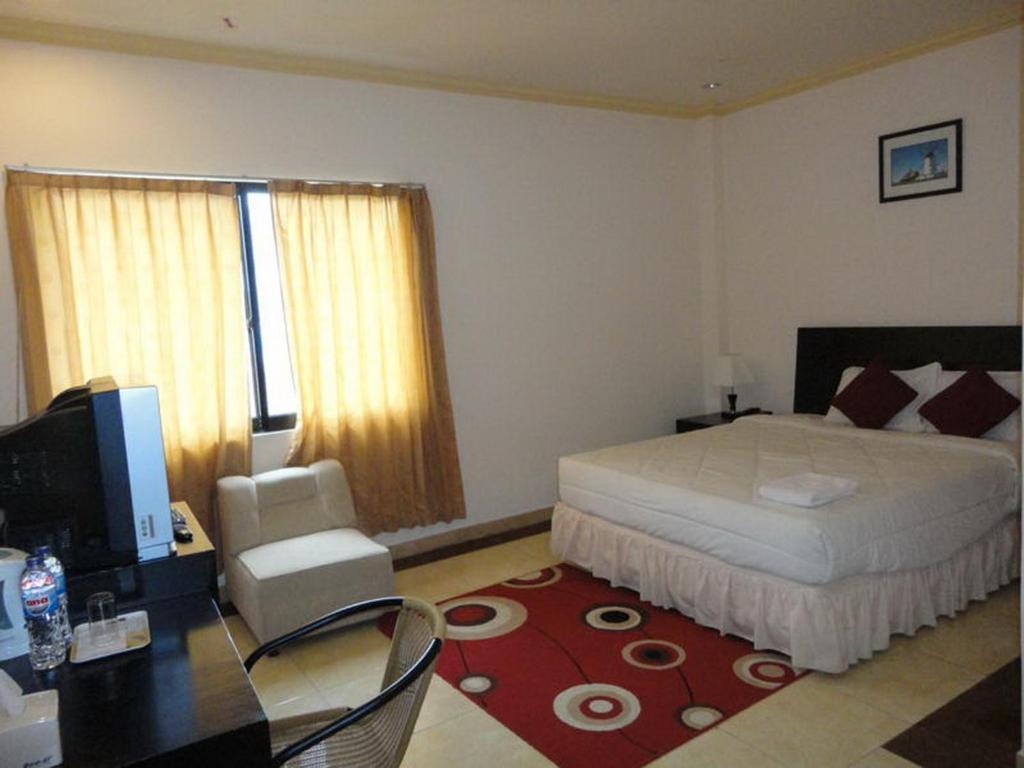 Grand Duta Hotel 팔루 객실 사진